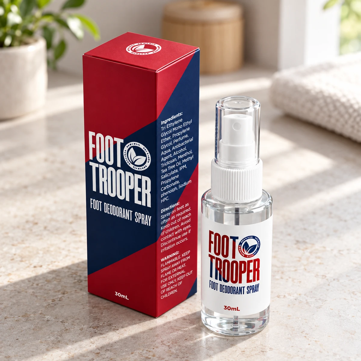 Foot Trooper – flacone spray su un piano in pietra in bagno